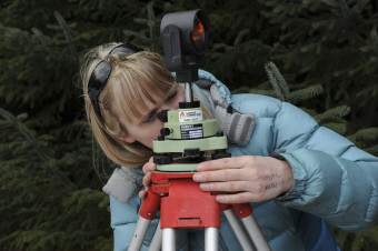 Archaeologist surveying the Thirlstane site 