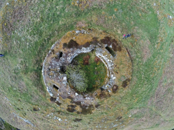 A hollow,. circular stone structure
