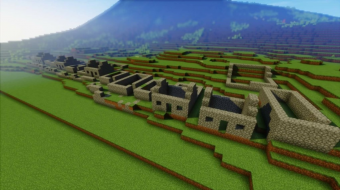 The ruined squat stone houses of St Kilda on the side of a green mountain as represented in cubic form in Minecraft.