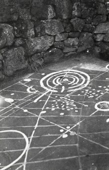 Stone with abstract symbols on it