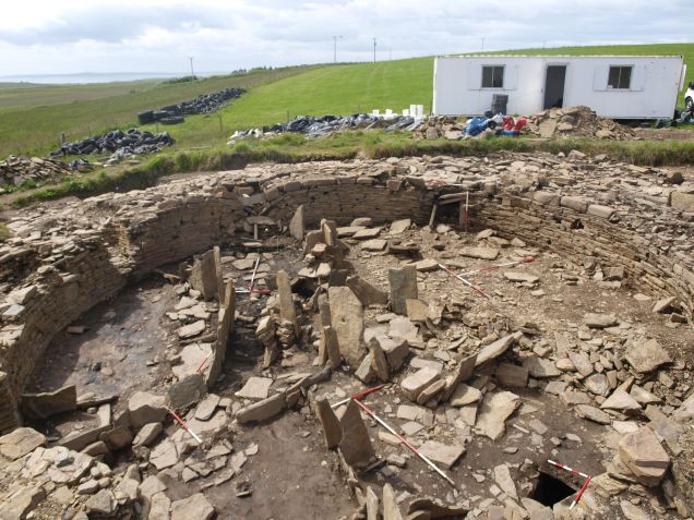 A dig taking place with a lot of stones around the site