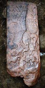 One side of the newly-discovered Pictish stone with various carvings