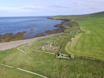 Aerial photograph of the trenches which revealed walls from the large Norse building