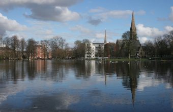 A large pond in a city