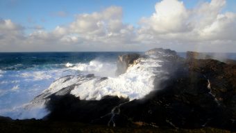 Waves crashing against rocks