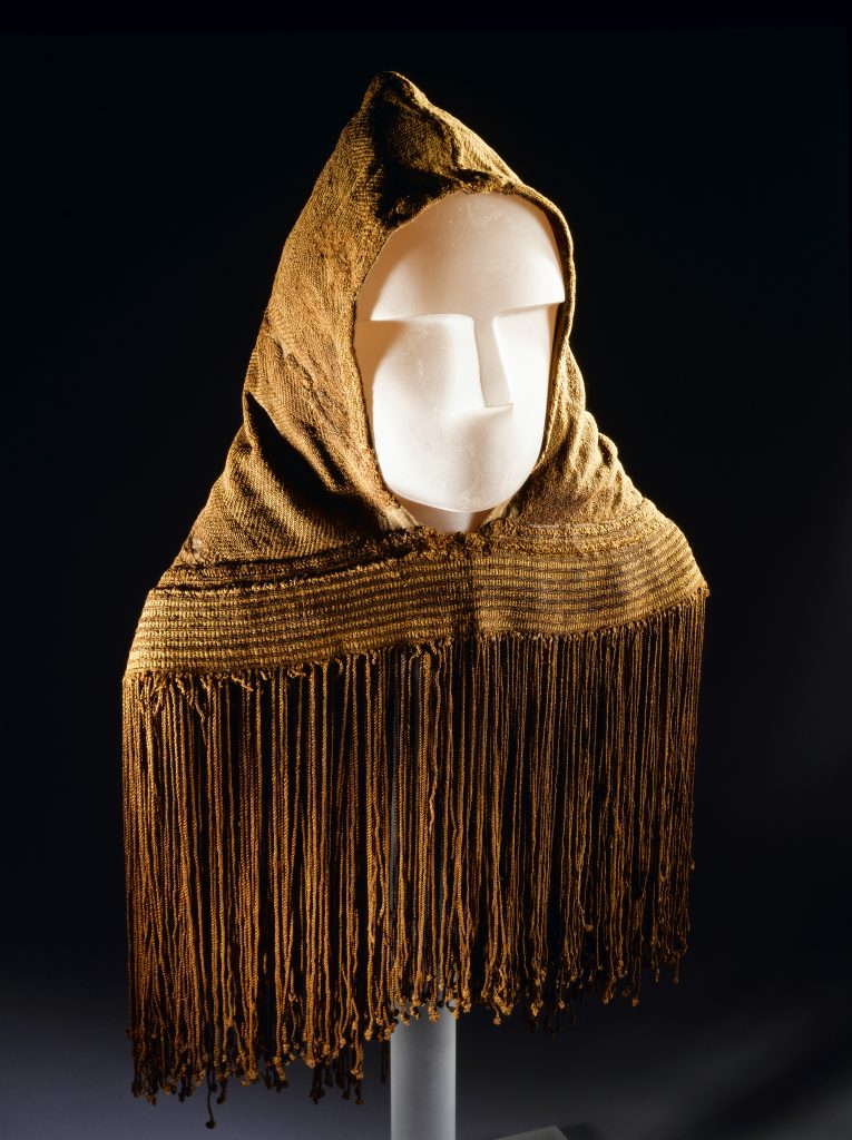 Photo of a brown fringed hood 