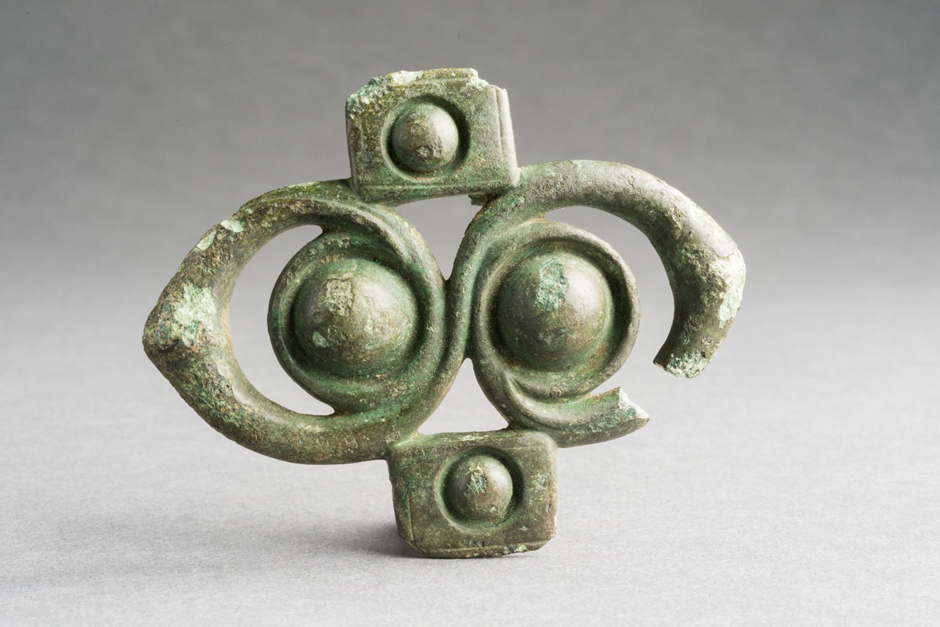A decorative green object