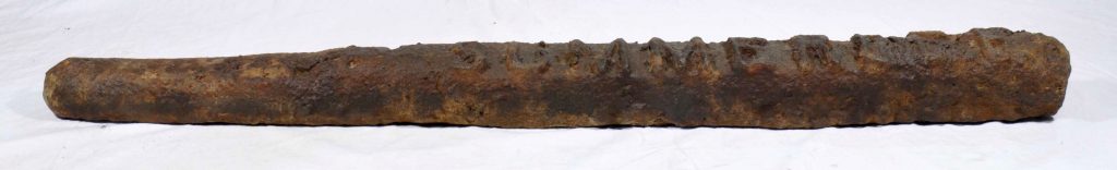 [IMAGE 5: A bar of pig iron found at Summerlee.]