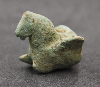 Photo of a small stone winged horse artefact