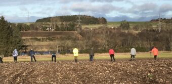 People walking in a field