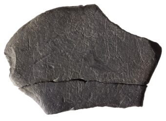 An inscribed slate showing a hostage being bound