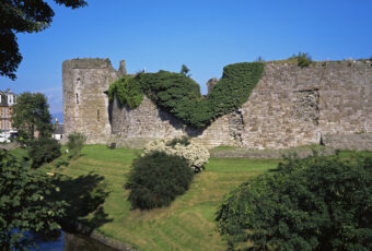 Photo of a stone castle wall on an island