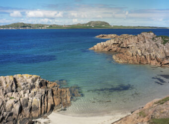 Photo of a rocky bay looking over to an island
