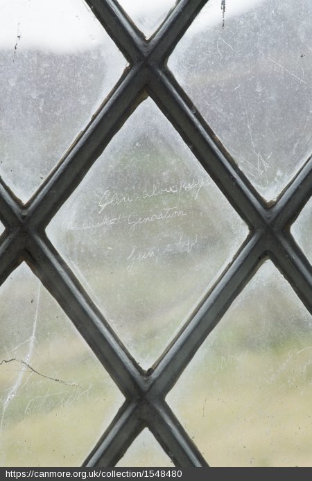 Writing scratched into a window pane
