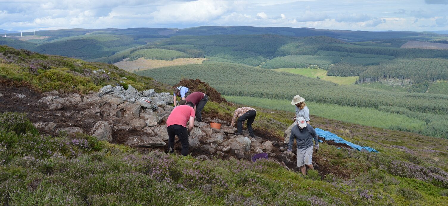 People excavating on a hill