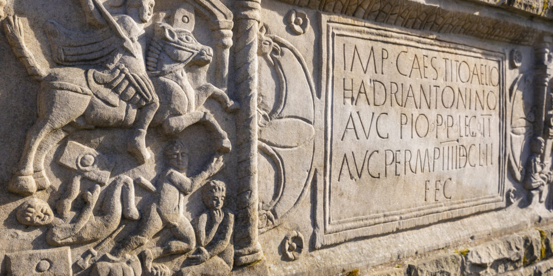 Photo of a carved Roman stone distance slab