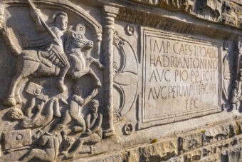 Photo of a carved Roman stone distance slab