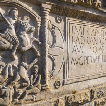 Photo of a carved Roman stone distance slab
