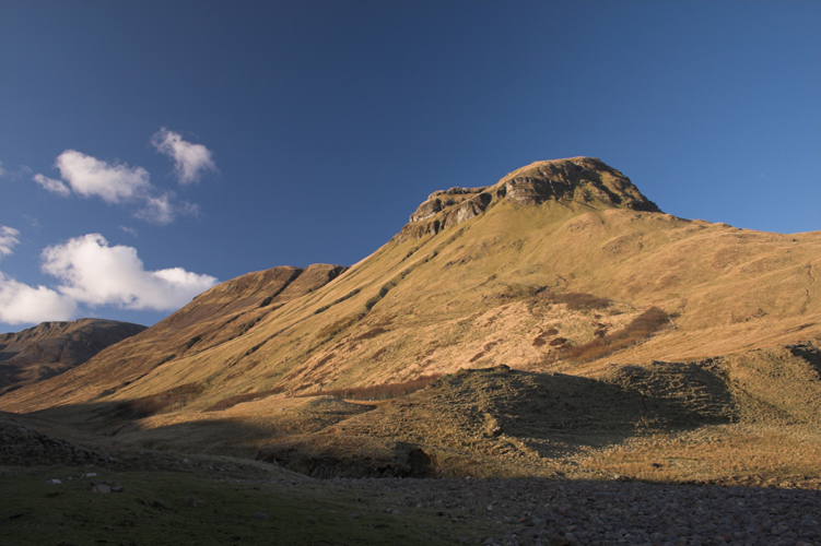 Photo of a hill at sunrise