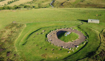 Aerial photo of a henge monument and burial cairn