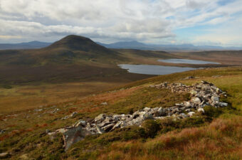 Crumbling stone walls on a mountainside