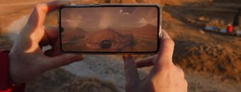 Photo of hands holding a mobile phone