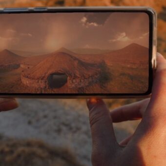 Photo of hands holding a mobile phone