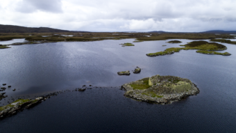 Photo of an artificial island in a loch