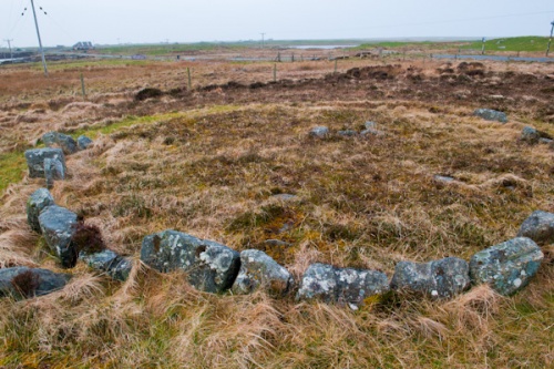 Photo of the stone remains of an Iron Age wheelhouse