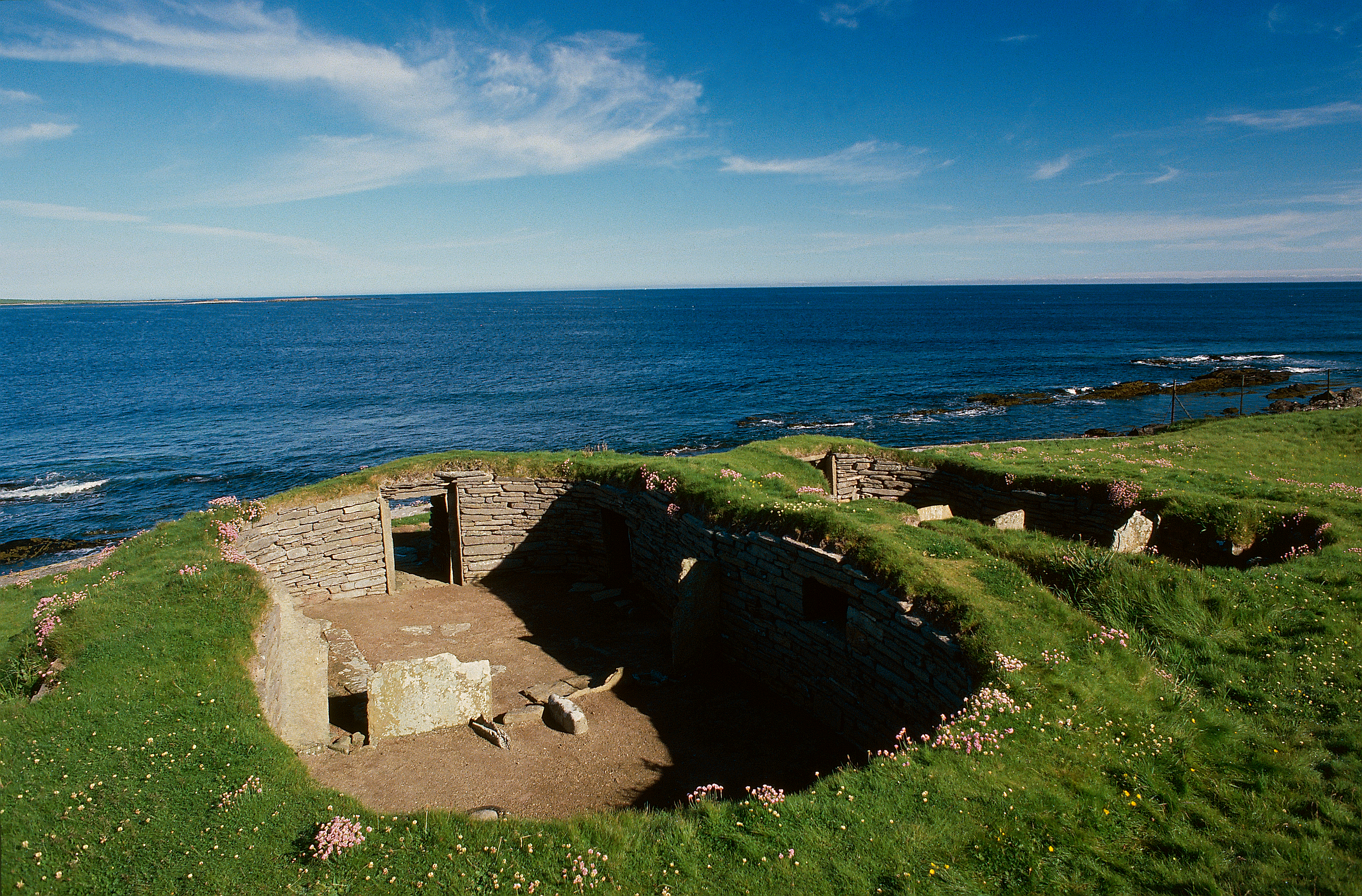 Two excavated and preserved Neolithic dwellings by the sea