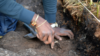 Person digging in a trench
