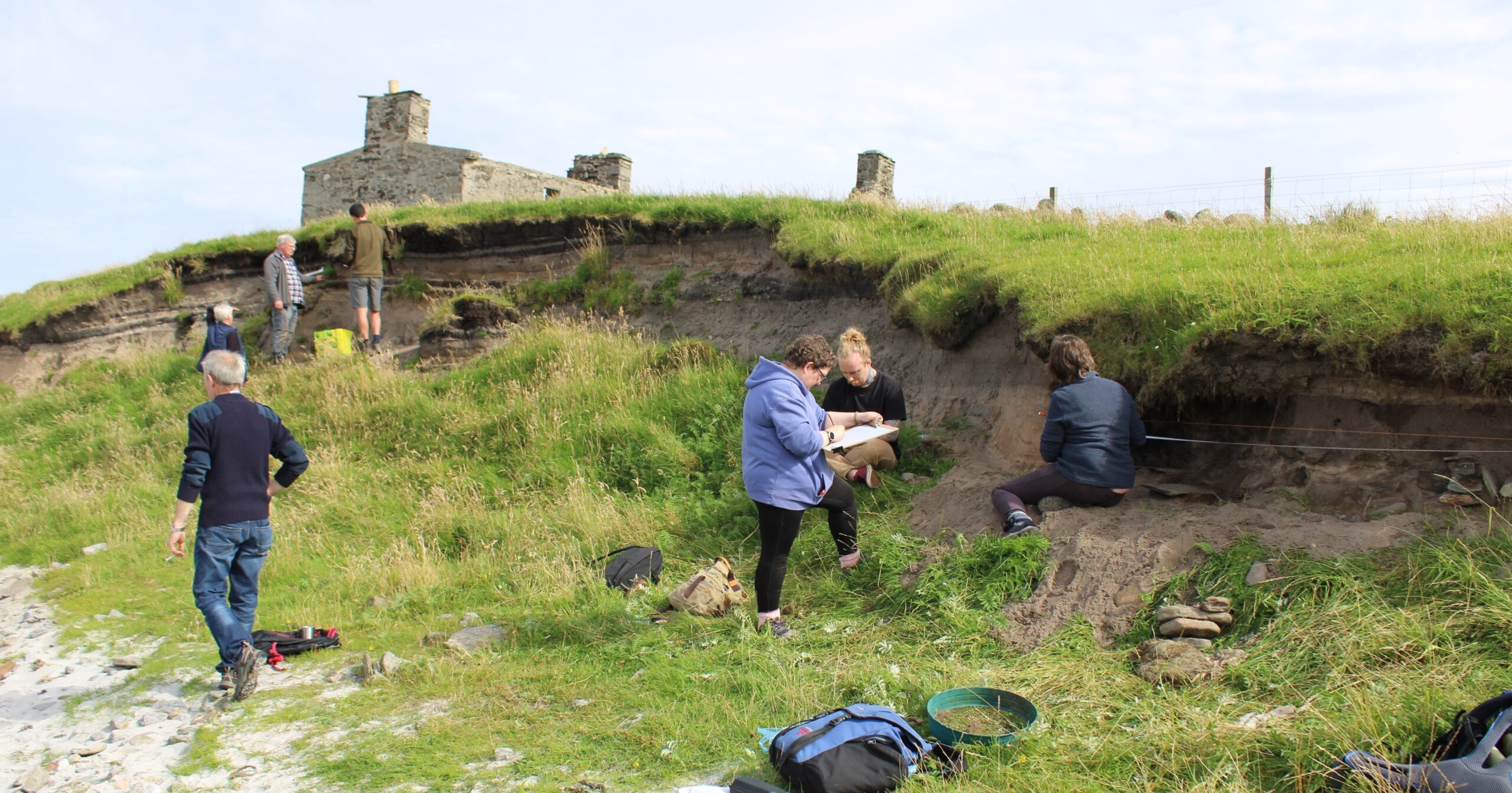 Photo of volunteers recording coastal erosion