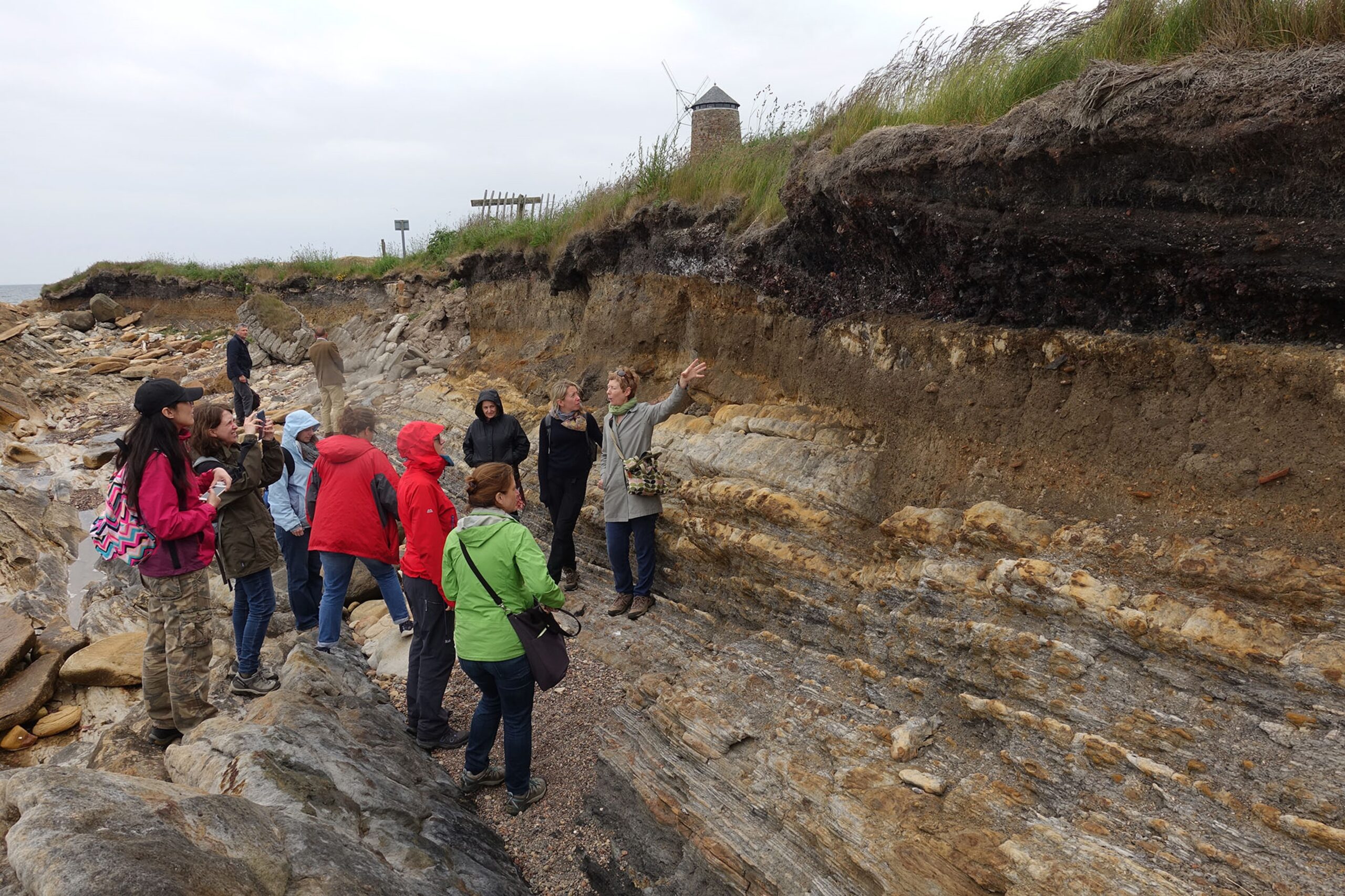 Photo of a group of volunteers recording coastal erosion