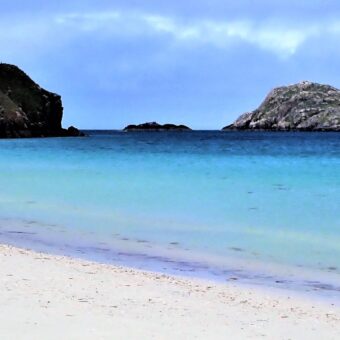 White beach with blue water