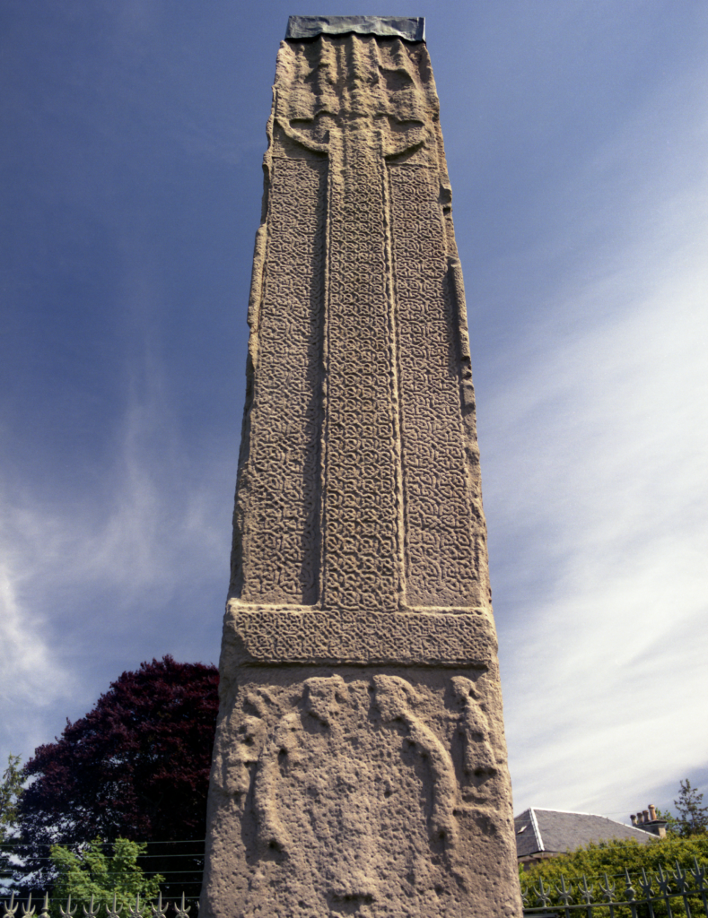 Photo of a seven-metre-tall stone column carved with a Christian cross