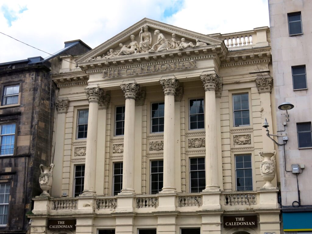 Photo of a grand 18th-century bank on a High Street, with four columns on the exterior