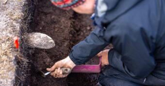 Person digging in a trench