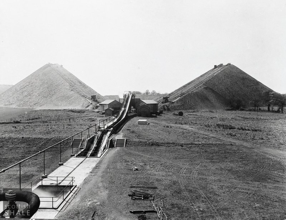 Black and White negative, possibly c. 1950, of two of the famous Five Sisters shale bings