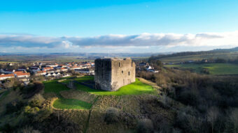 Aerial view of a large ruined castle