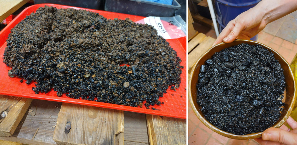 Photo of gravel-like residue laid out on a red tray and black, charred grains in a paper bowl