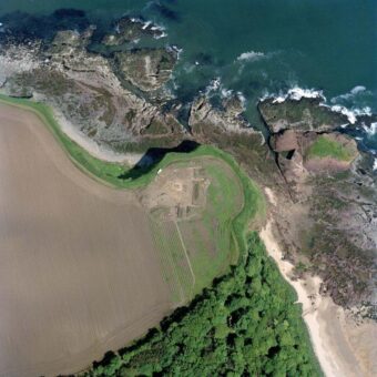 Aerial view of an excavated site on the cliffside