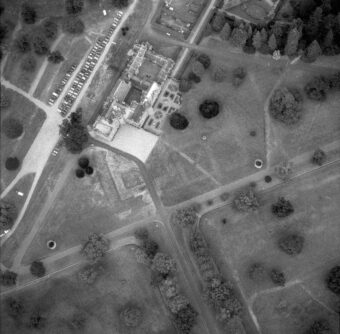 Black and white aerial photo of the cropmark remains of lost ornamental gardens at a country house