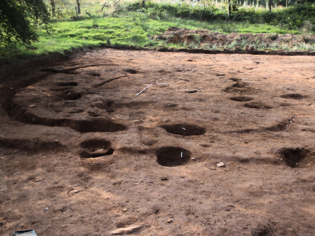Excavated holes in the ground