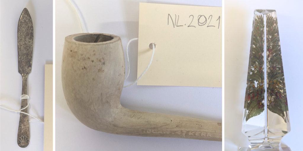 Collage of three images: left; a silver letter opener, middle; a a small white smoking pipe; right; a decorated glass paperweight