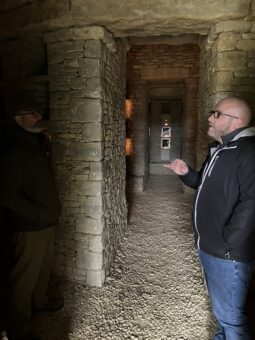 Person conducts an interview in a barrow built in 2019 that is used to store cremated remains