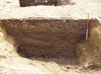 Photo of a cross section in an archaeological trench on a building site