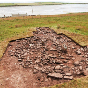 Photo of an archaeological trench by the sea