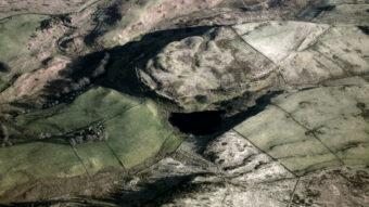 Aerial view of a landscape, including a fort site