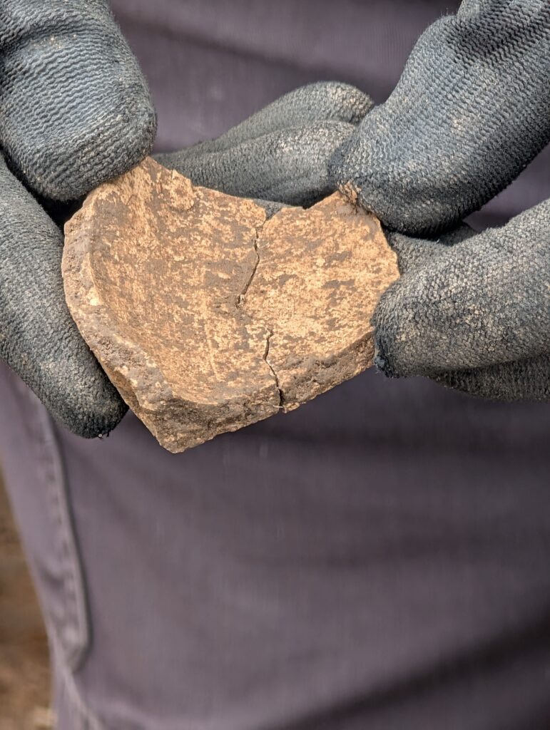 A piece of 12th century white gritty ware pottery from Scotland