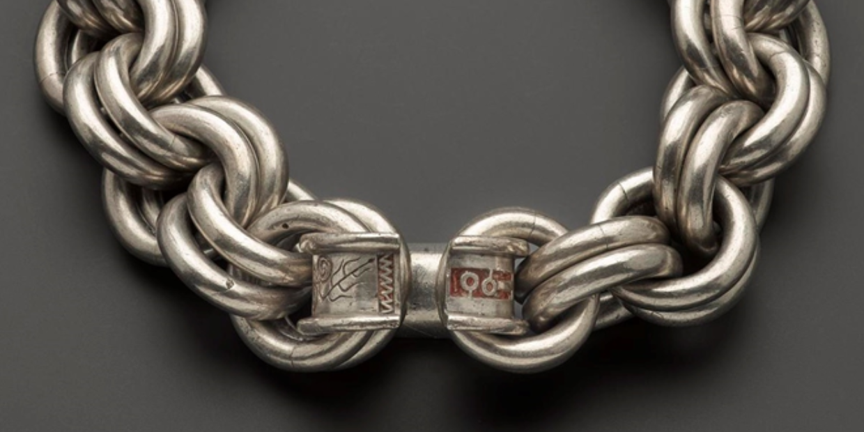 Large silver chain with a decorated portion